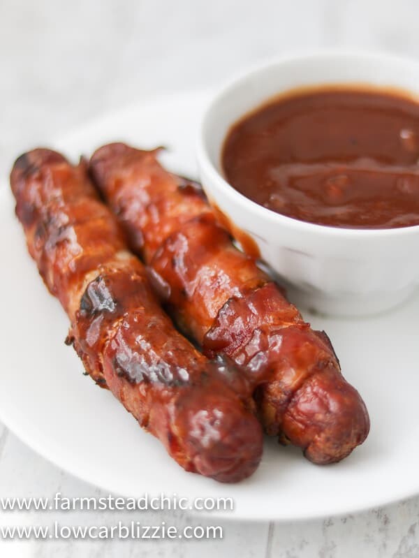 These Low Carb, Keto BBQ Bacon-Wrapped Hot Dogs are sure to be a hit with everyone, especially the kiddos. Who can say no to a grilled hot dog wrapped in bacon and slathered with a sweet and spicy (if you want) barbecue sauce? You only need three ingredients, ten minutes and a grill to get these puppies started. Come on! 