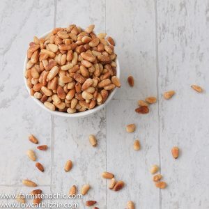 How to toast pine nuts! This super-quick, super-easy instructional post on how to toast pine nuts will bring your dreams of homemade keto pesto to life. All you need is a frying pan, a wooded spoon, and well, pine nuts! 