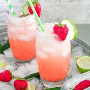 These Low Carb, Keto Strawberry Serrano Margaritas are the perfect complement to your Keto Summer BBQ. Made with a fresh strawberry, a serrano pepper and fresh lime juice, these Keto margaritas are fresh, sweet, spicy and tangy. And they only have 3 net carbs each! #farmsteadchic #ketomargarita #lowcarbmargarita #ketococktail #lowcarbcocktail #margaritarecipe #strawberrymargarita #spicymargarita