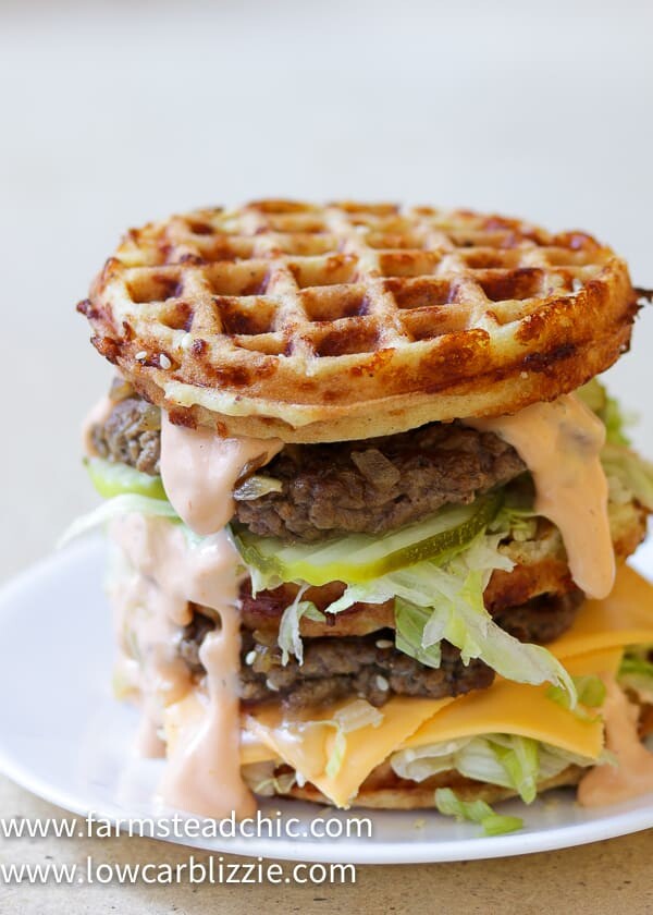 The perfect Chaffle bun, super thin, juicy, perfectly seasoned hamburger patty, crunchy dill pickles, shredded iceberg lettuce, American cheese and Thousand Island dressing make this Keto Big Mac Chaffle taste like the real thing without all the harmful additives and questionable ingredients.  #ketobigmac #bigmacchaffle #lowcarbbigmac #lowcarbburger #chaffle #farmsteadchic 