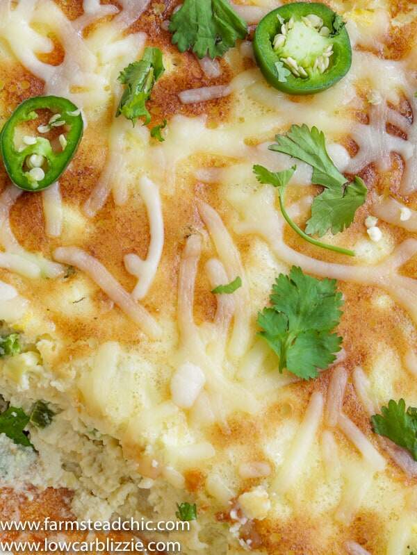 This Low Carb, Keto Jalapeño Corn Casserole is gluten free, grain free, moist, sweet and fluffy and filled with baby corn, juicy summer squash, fresh jalapeños and creamy cheese. | www.farmstmeadchic.com | #keto #lowcarb #glutenfree #grainfree #lowcarbcorncasserole #jalapenocorncasserole #farmsteadchic