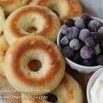 These Low Carb, Keto Bagels are based on the Fathead dough recipe and use mozzarella cheese, cream cheese, almond flour and eggs to make a dough that's surprisingly light and cream-cheese-spreadable. Add some smoked salmon, capers and sliced red onion for a Bagel and Lox. #farmsteadchic #lowcarbbagel #ketobagel #bagelandlox #smokedsalmonbagel #fatheadbagel #lowcarbbreakfast #ketobreakfast