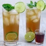 This Low Carb, Keto Spiced Rum Mojito is a sugar-free, snappy take on the traditional Cuban cocktail. While a regular mojito can add up to 50 carbs (or more), this Keto Mojito is less than two carbs! You can't go wrong with dark spiced rum, tangy lime juice and fresh mint leaves. | www.farmsteadchic.com | #ketococktail #lowcarbcocktail #mojito #ketomojito #lowcarbmojito #farmsteadchic #darkrummojito #spicedrummojito