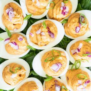 These Korean kimchi keto deviled eggs are a spicy and flavorful twist on traditional deviled eggs. Made with only four ingredients (plus S&P), they a super simple, naturally low carb and keto-friendly appetizer or snack.